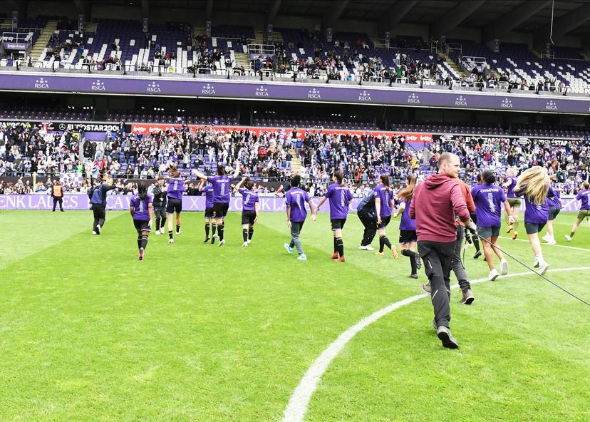 RSCA's players celebrate after winning the Super League women's championship, after a soccer game between RSCA Women and KRC Genk, Saturday 25 May 2024 in Brussels, on day 10/10 of the play-off group A of the Super League women's championship.  BELGA PHOTO JILL DELSAUX