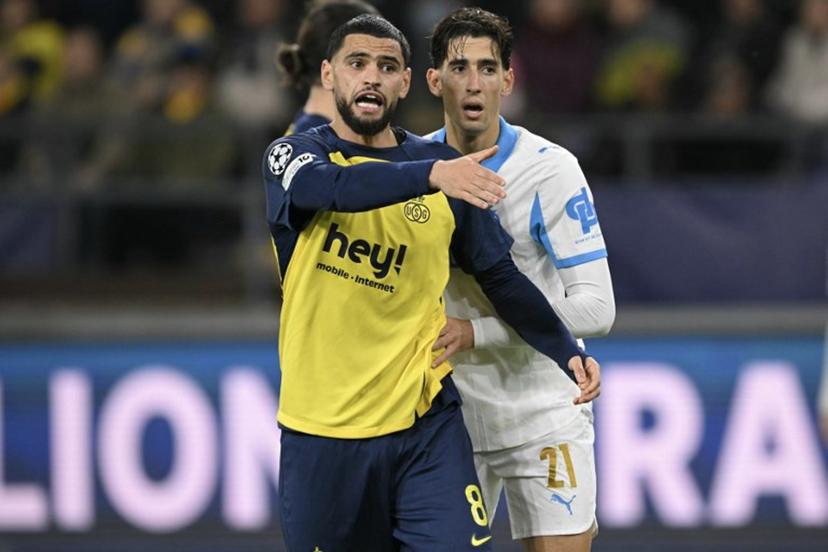 Union St-Gilloise's Algerian midfielder #08 Adem Zorgane reacts during the UEFA Champions League, league phase day 6, football match between Royale Union Saint-Gilloise (BEL) and Olympique de Marseille (FRA), at the RSC Anderlecht Stadium in Brussels, on December 9, 2025.  NICOLAS TUCAT / AFP