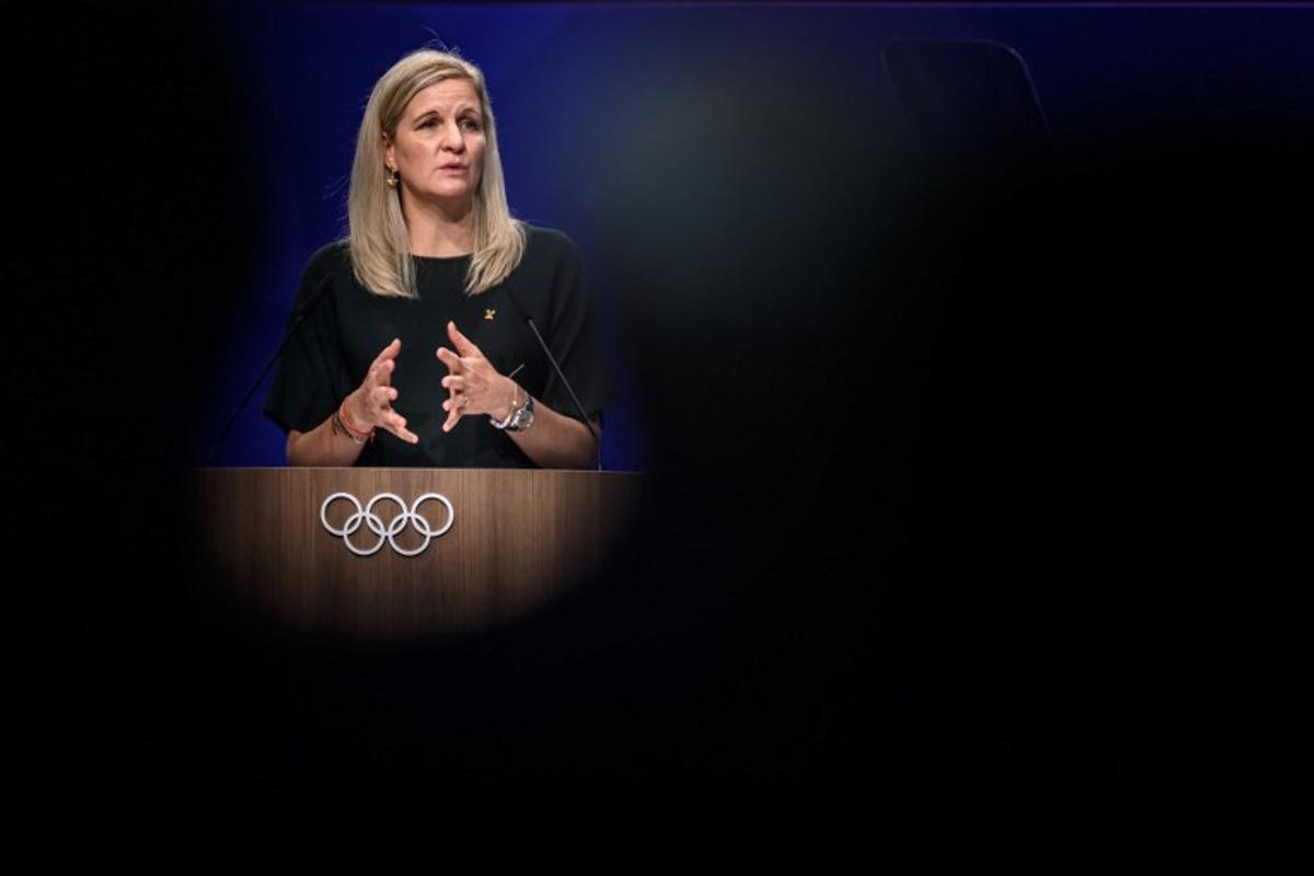 International Olympic Committee President (IOC) Kirsty Coventry delivers her speech at the opening of an IOC session, in Lausanne, on June 24, 2026.  Fabrice COFFRINI / AFP