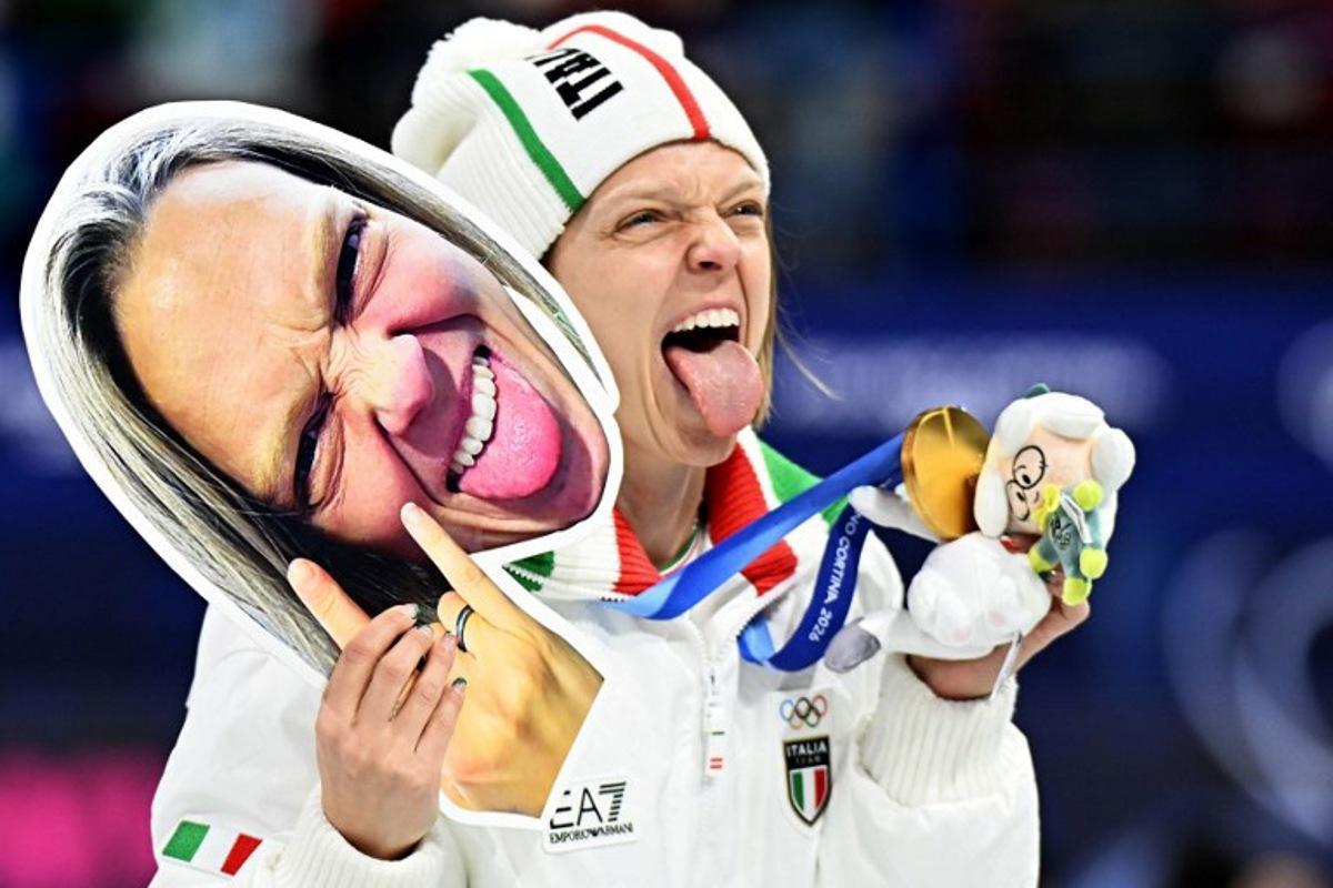 Italy's Arianna Fontana poses with her medal on the podium after winning gold in the short track speed skating mixed team relay final during the Milano Cortina 2026 Winter Olympic Games at Milano Ice Skating Arena in Milan on February 10, 2026.  Gabriel BOUYS / AFP