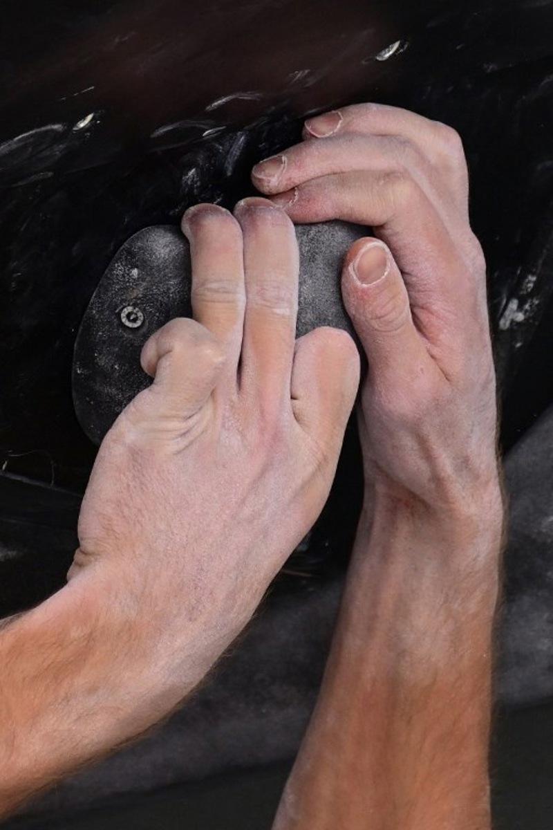 Italy's Filip Schenk competes during the Men's Boulder and Lead climbing Final event of the European Championships Munich 2022 in Munich, southern Germany on August 18, 2022.  INA FASSBENDER / AFP