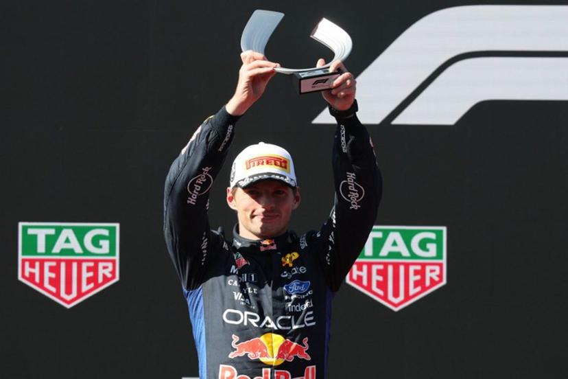 Second placed Red Bull Racing's Dutch driver Max Verstappen celebrates on the podium after the Spanish Formula One Grand Prix at the Madring circuit on September 13, 2026 in Madrid.  Thomas COEX / AFP
