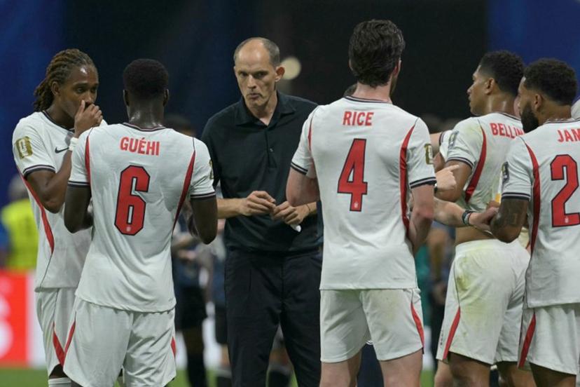 England's German head coach Thomas Tuchel (C) instructs his players in the hydration break during the 2026 World Cup football tournament semi-final match between England and Argentina at the Atlanta Stadium in Atlanta on July 15, 2026.   JUAN MABROMATA / AFP