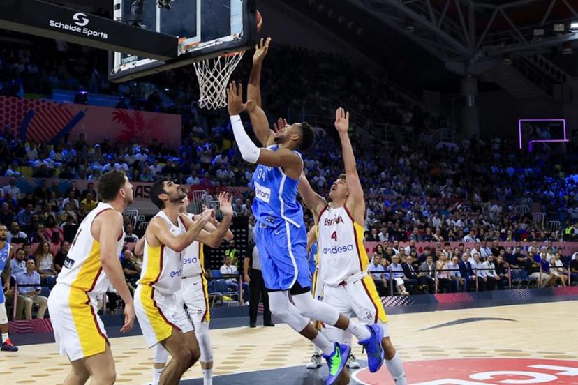 Greece's small forward #34 Giannis Antetokounmpo drives to the basket during the FIBA EuroBasket 2025 basketball match between Spain and Greece at Spyros Kyprianou Arena in Limassol on September 4, 2025.  ALEX MITA / AFP