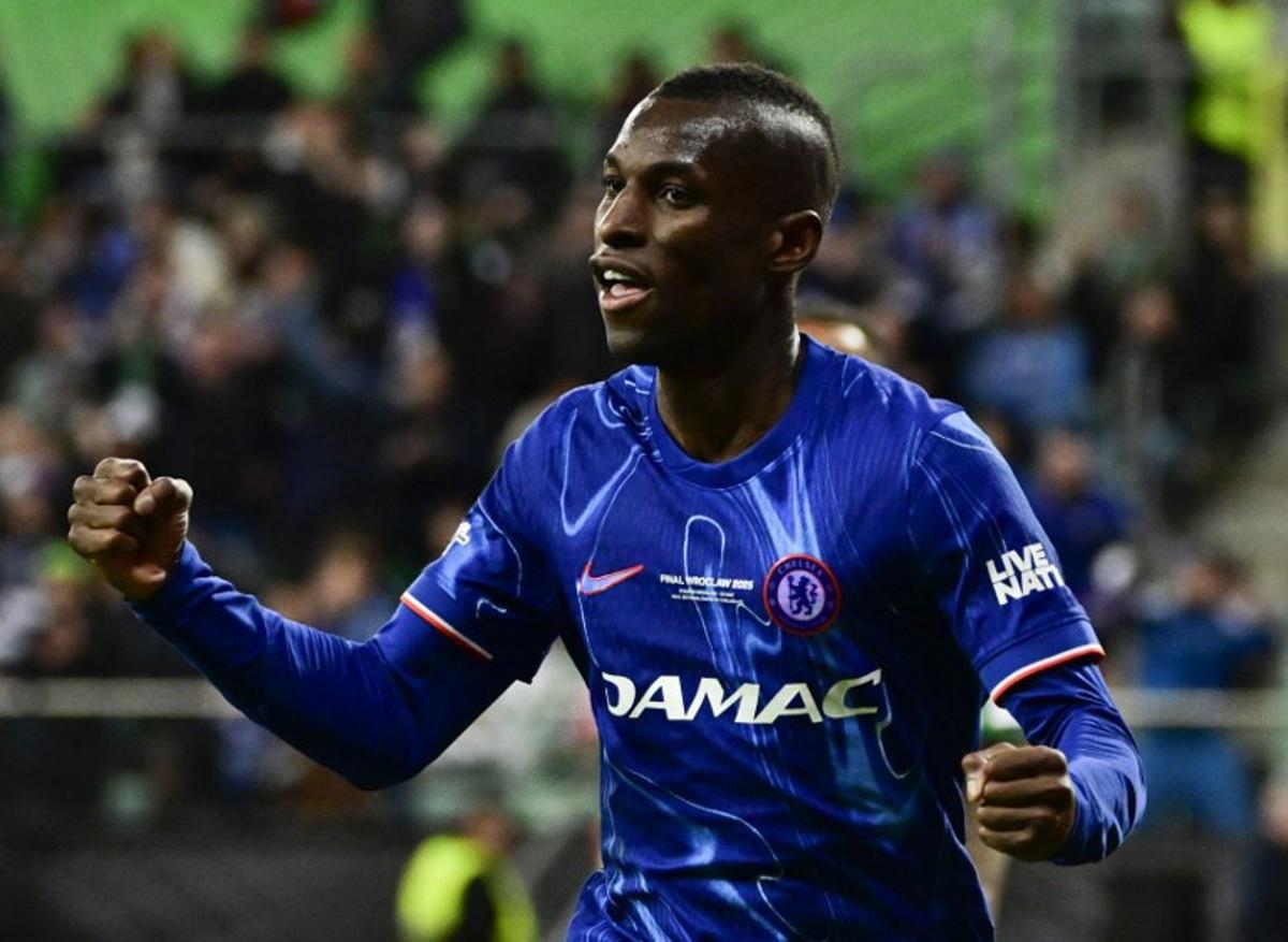 Chelsea's Senegalese striker #15 Nicolas Jackson celebrates scoring the 1-2 during the UEFA Conference League final football match between Real Betis and Chelsea FC in Wroclaw on May 28, 2025.   John MACDOUGALL / AFP