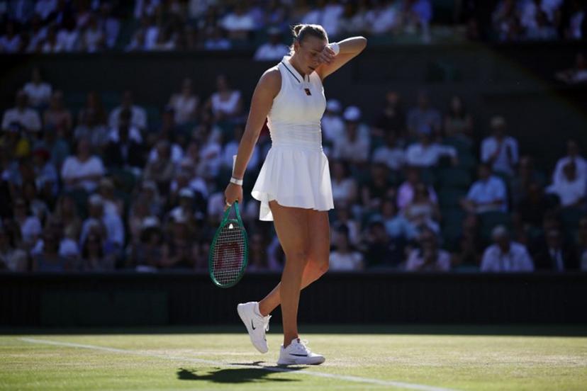 US player Amanda Anisimova reacts as she plays against US player Madison Keys during their women's singles third round tennis match on the sixth day of the 2026 Wimbledon Championships at The All England Lawn Tennis and Croquet Club in Wimbledon, southwest London, on July 4, 2026.  Henry NICHOLLS / AFP