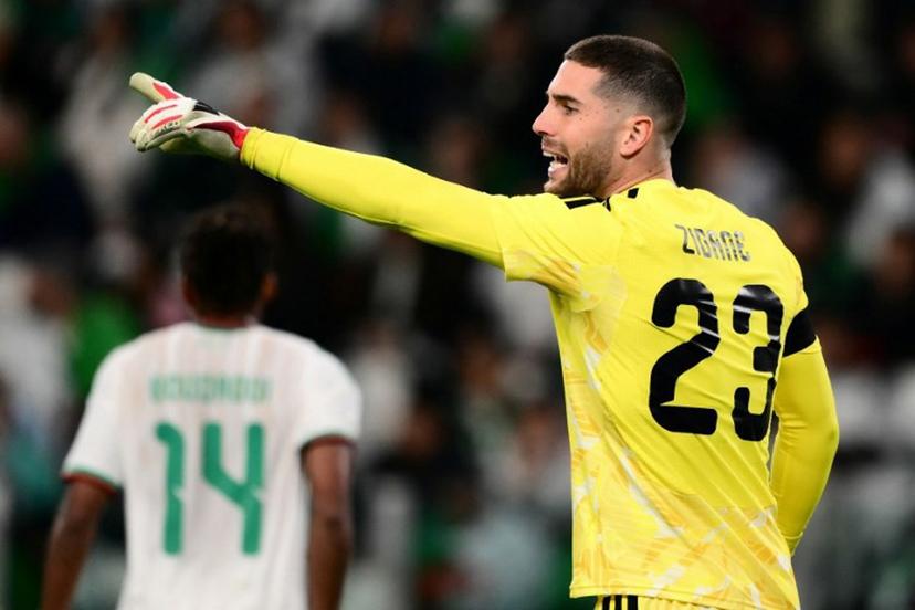 Algeria's goalkeepers #23 Luca Zidane (R) gestures during the friendly international football match between Algeria and Uruguay at the Allianz Stadium in Turin on March 31, 2026.  MARCO BERTORELLO / AFP