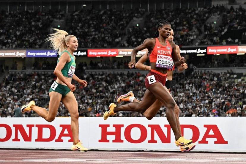 Australia's Jessica Hull (L) and Kenya's Lilian Odira run to the finish line in the women's 800m semi-final during the World Athletics Championships in Tokyo on September 19, 2025.  Jewel SAMAD / AFP