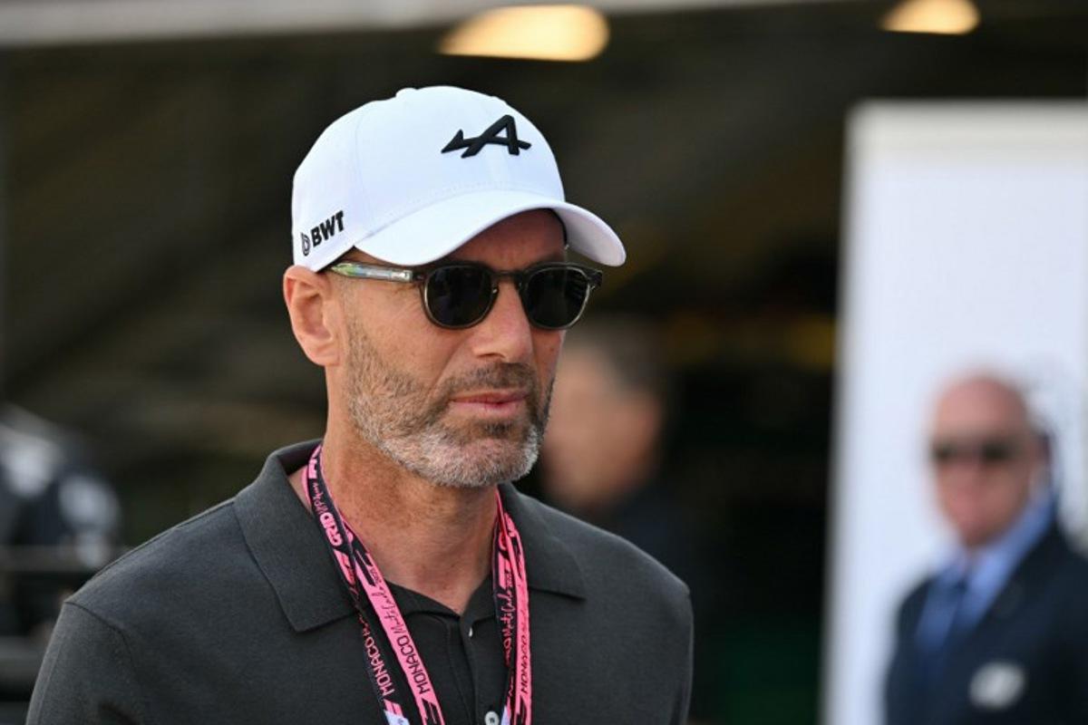 Former French footballer and manager Zinedine Zidane walks down the pit lane ahead the Formula One Monaco Grand Prix at the Circuit de Monaco, on May 25, 2025.  Andrej ISAKOVIC / AFP