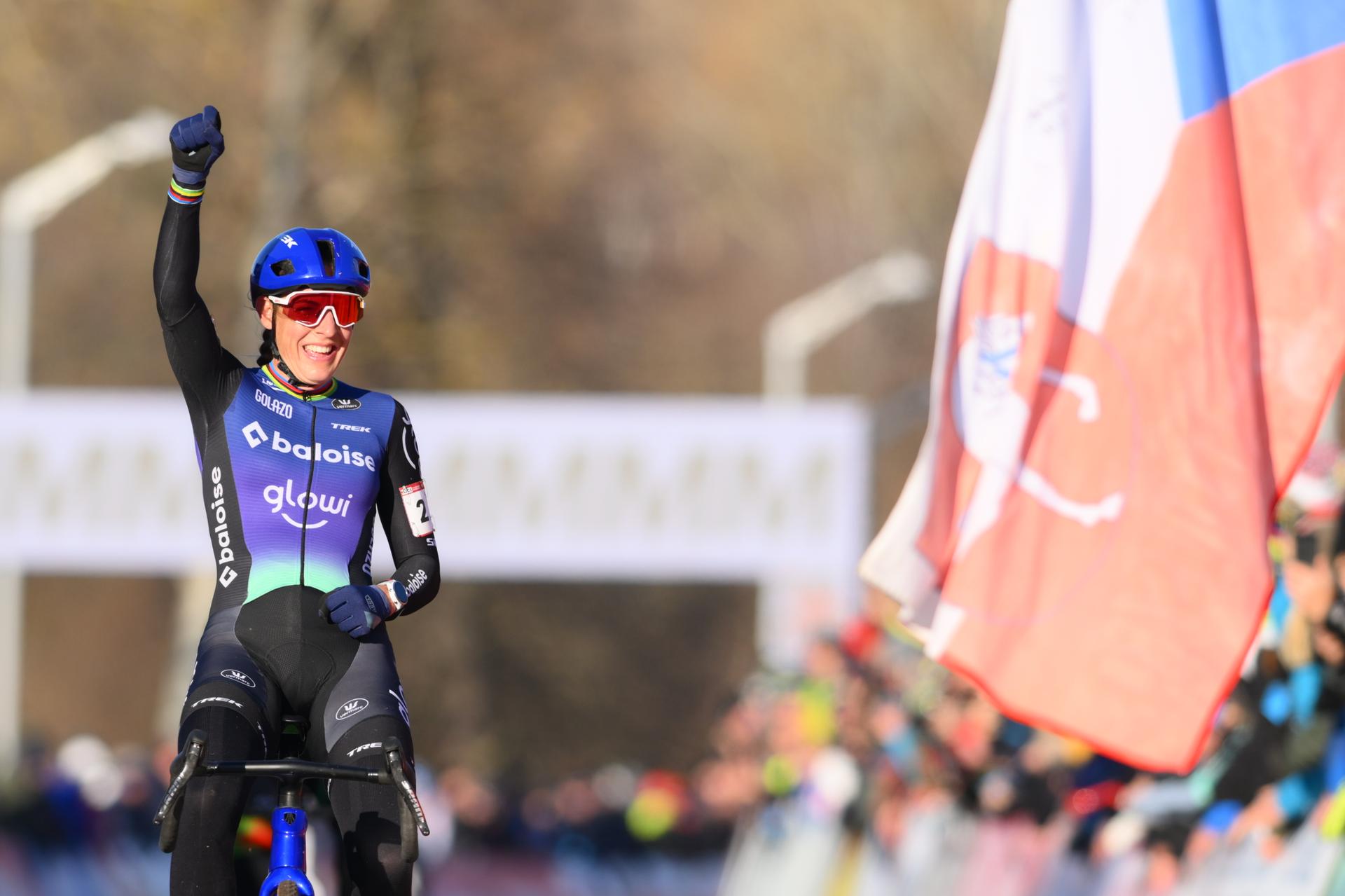 Dutch Lucinda Brand celebrates as she crosses the finish line to win the women elite race at the World Cup cyclocross cycling event in Tabor, Czech Republic, stage 1 (out of 12) of the UCI World Cup cyclocross competition, Sunday 23 November 2025. BELGA PHOTO DAVID PINTENS