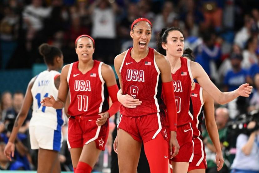 (From L) USA's #11 Napheesa Collier, USA's #09 A'ja Wilson and USA's #10 Breanna Stewart react in the women's Gold Medal basketball match between France and the USA during the Paris 2024 Olympic Games at the Bercy  Arena in Paris on August 11, 2024.  Aris MESSINIS / AFP