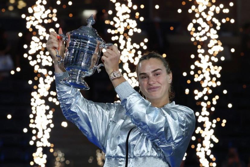 Belarus's Aryna Sabalenka poses with the trophy after defeating USA's Amanda Anisimova during their women's singles final tennis match on day fourteen of the US Open tennis tournament at the USTA Billie Jean King National Tennis Center in New York City, on September 6, 2025.  TIMOTHY A.CLARY / AFP