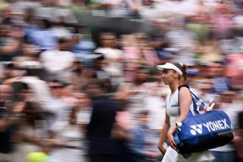 Belgium's Elise Mertens reacts as she leaves the Centre Court following her defeat against Belarus's Aryna Sabalenka during their women's singles fourth round tennis match on the seventh day of the 2025 Wimbledon Championships at The All England Lawn Tennis and Croquet Club in Wimbledon, southwest London, on July 6, 2025.  Kirill KUDRYAVTSEV / AFP