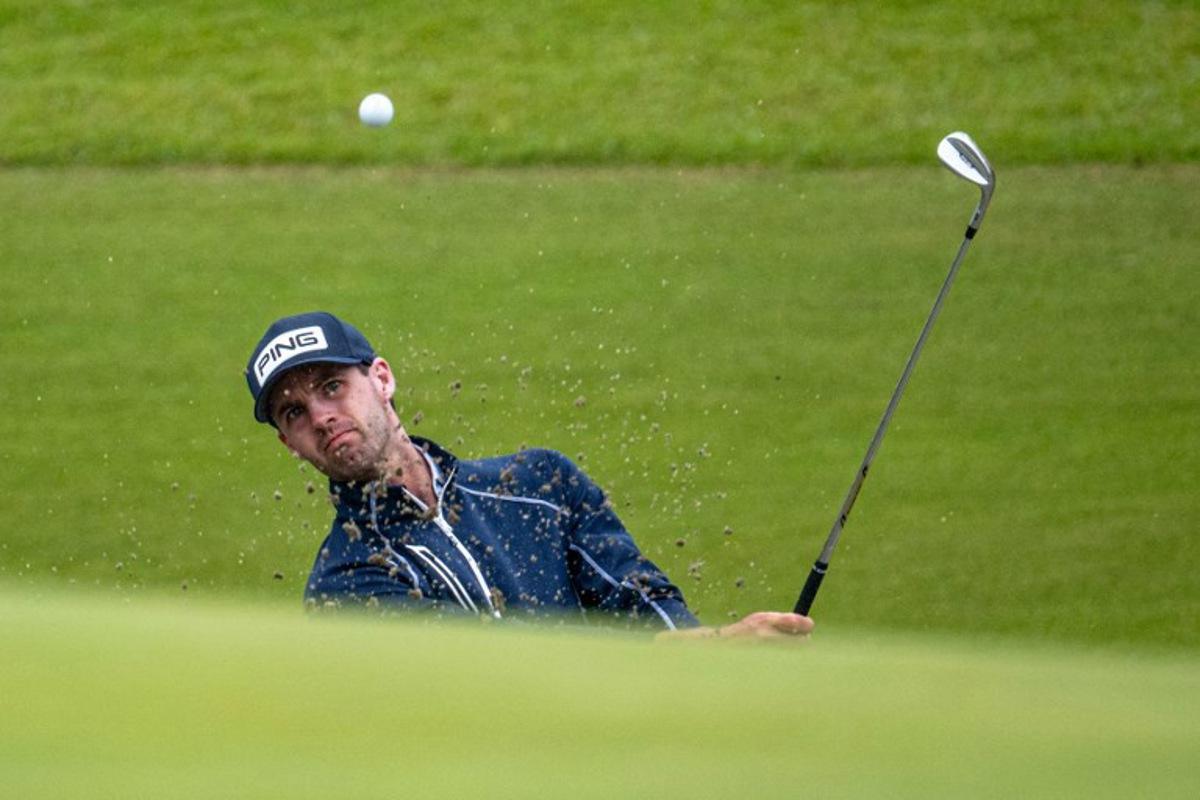 USA's Alex Smalley plays a shot during the Baycurrent Classic golf tournament in Yokohama on October 11, 2025.  Philip FONG / AFP
