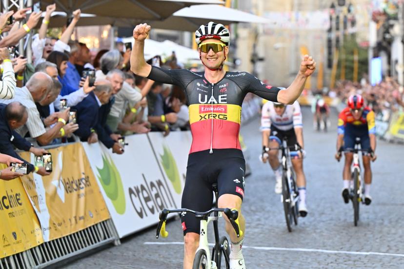 Belgian Tim Wellens of UAE Team Emirates celebrates as he crosses the finish line of the 'Natourcriterium Aalst' cycling event, Monday 28 July 2025 in Aalst. The traditional 'criteriums' are local showcases for which mainly cyclists who rode the Tour de France are invited. BELGA PHOTO ERIC LALMAND