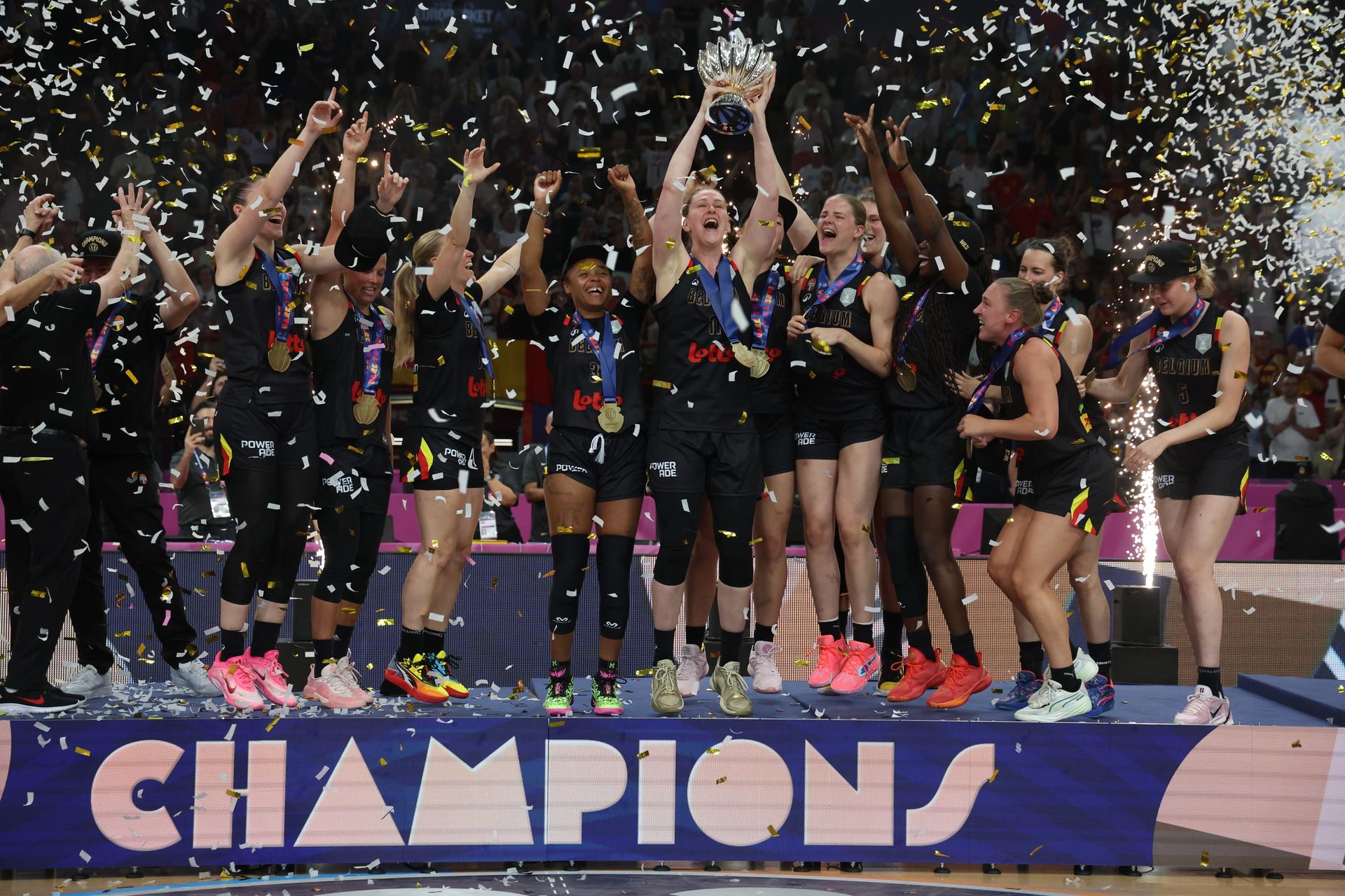 Belgium's captain Emma Meesseman celebrates this the cup on the podium after winning a basketball match between Spain and Belgian national team 'the Belgian Cats' on Sunday 29 June 2025 in Piraeus, Greece, the final of the FIBA Women's EuroBasket 2025.  BELGA PHOTO VIRGINIE LEFOUR