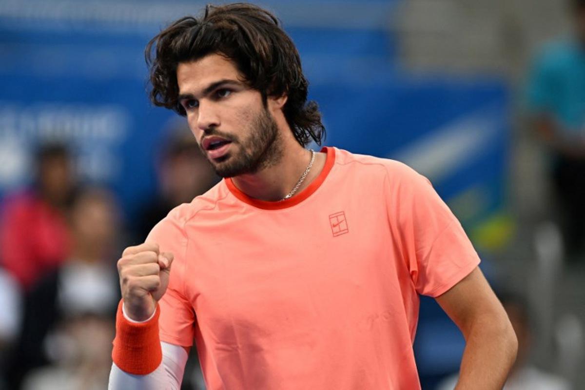 Spain's Carlos Alcaraz reacts as he plays against compatriot Jaume Munar during their men's singles semi-final tennis match at the ATP Tour Japan Open Tennis Championships at the Ariake Tennis Forest Park in Tokyo on October 5, 2026.   Rie KIKUCHI / AFP