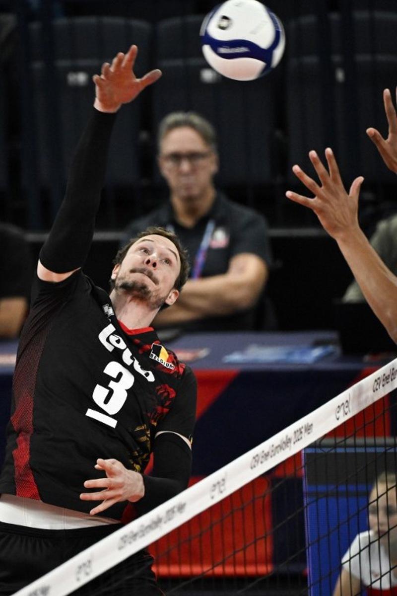 Belgium's Sam Deroo reaches for the ball during the men's volleyball European Championships Pool C match Netherland vs Belgium in Tampere, Finland, on September 11, 2026.   Emmi Korhonen / Lehtikuva / AFP