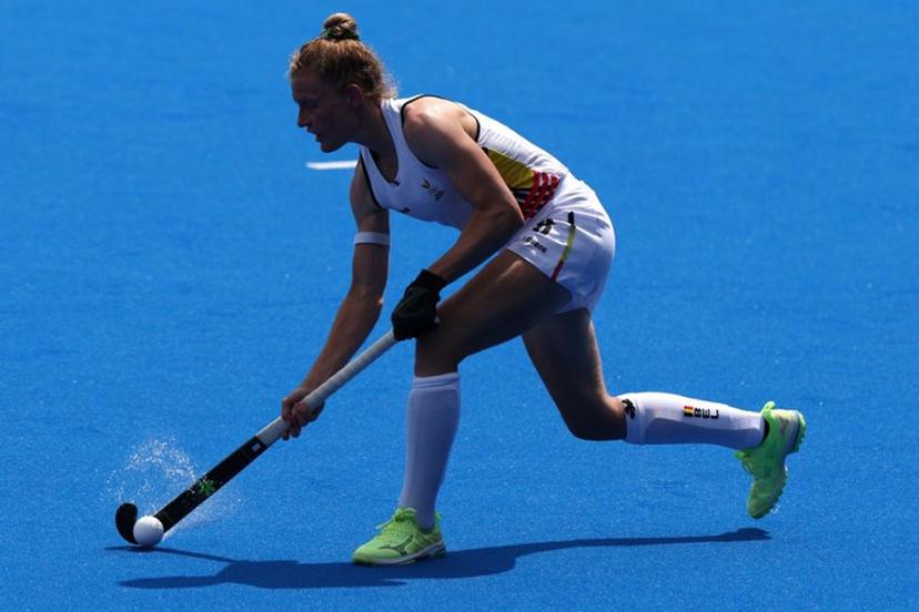 Belgium's defender #08 Emma Puvrez passes the ball in the women's pool A field hockey match between Belgium and the Netherlands during the Paris 2024 Olympic Games at the Yves-du-Manoir Stadium in Colombes on August 2, 2024.  Ahmad GHARABLI / AFP