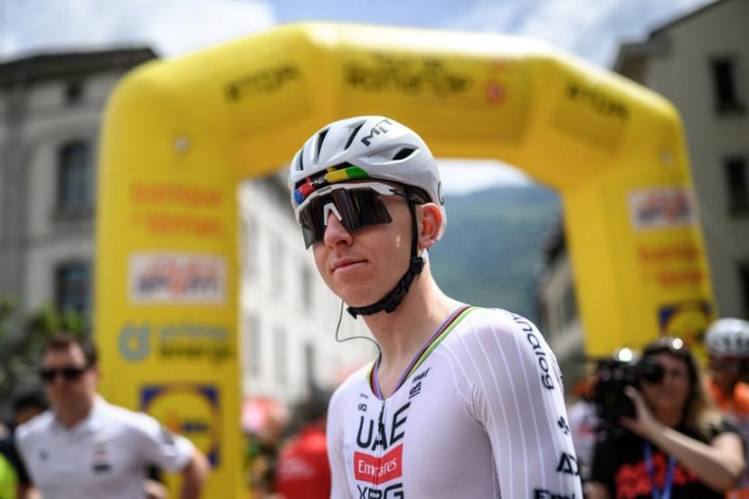 UAE Team Emirates-XRG's Slovenian rider Tadej Pogacar arrives for the teams' presentation prior to the first stage of the Tour of Romandie UCI cycling World tour, a 171.2 km loop from Martigny-Ville to Martigny-Ville, in Martigny on April 29, 2026.  Fabrice COFFRINI / AFP