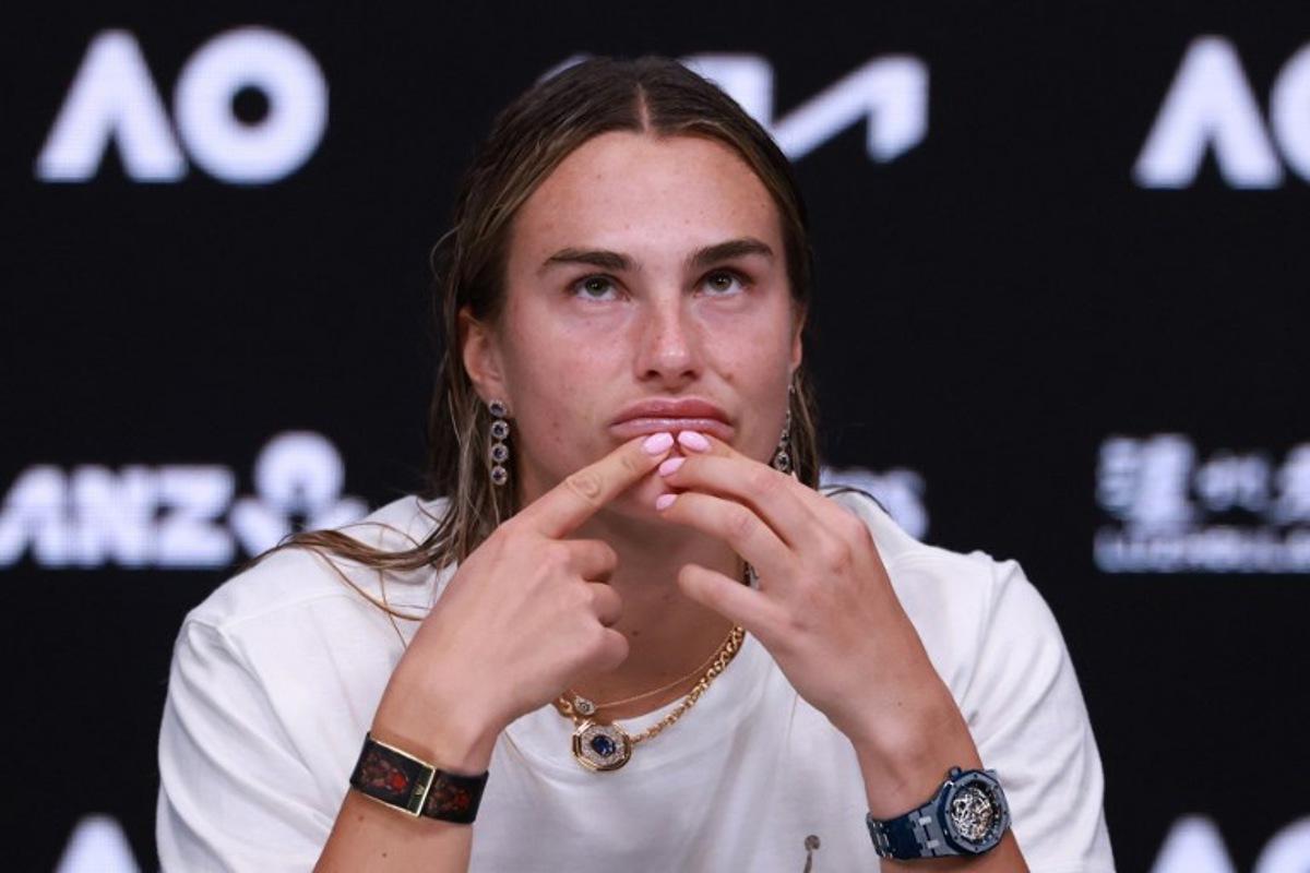 Belarus' Aryna Sabalenka speaks during a press conference after her defeat against Kazakhstan's Elena Rybakina during their women's singles final match on day fourteen of the Australian Open tennis tournament in Melbourne on January 31, 2026.  DAVID GRAY / AFP