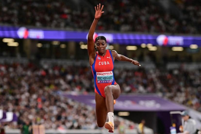 Cuba's athlete Leyanis Perez Hernandez competes in the women's triple jump final during the World Athletics Championships in Tokyo on September 18, 2025.  Ben STANSALL / AFP