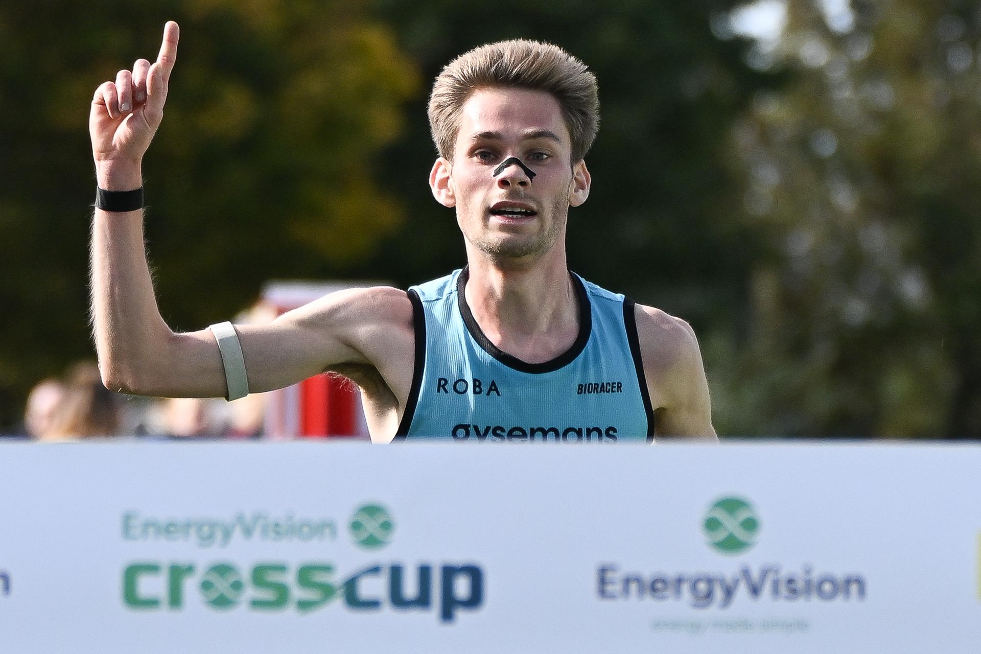 Belgian Yorick Van De Kerkhove celebrates as he crosses the finish line to win the men's race at the CrossCup cross country running athletics event in Roeselare on Sunday 25 October 2026.  BELGA PHOTO ELIAS ROM