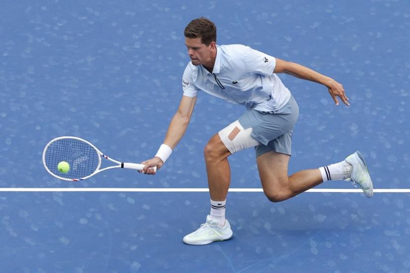 Belgium's Alexander Blockx hits a return to Argentina's Francisco Cerundolo in their men's singles round of 16 tennis match on day nine of the US Open tennis tournament at the USTA Billie Jean King National Tennis Center in New York on September 7, 2026.  KENA BETANCUR / AFP