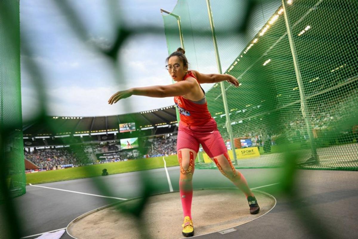 China's Bin Feng competes in the women's discus throw during the World Athletics Diamond League athletics meeting at the King Baudouin Stadium in Brussels, on September 4, 2026.  NICOLAS TUCAT / AFP