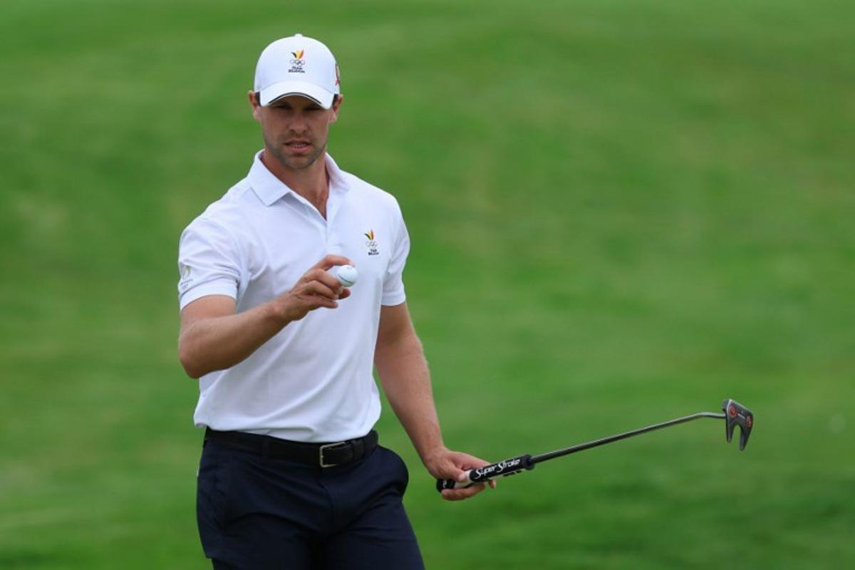 Belgium's Thomas Detry reacts in round 3 of the men's golf individual stroke play of the Paris 2024 Olympic Games at Le Golf National in Guyancourt, south-west of Paris on August 3, 2024.   Emmanuel DUNAND / AFP