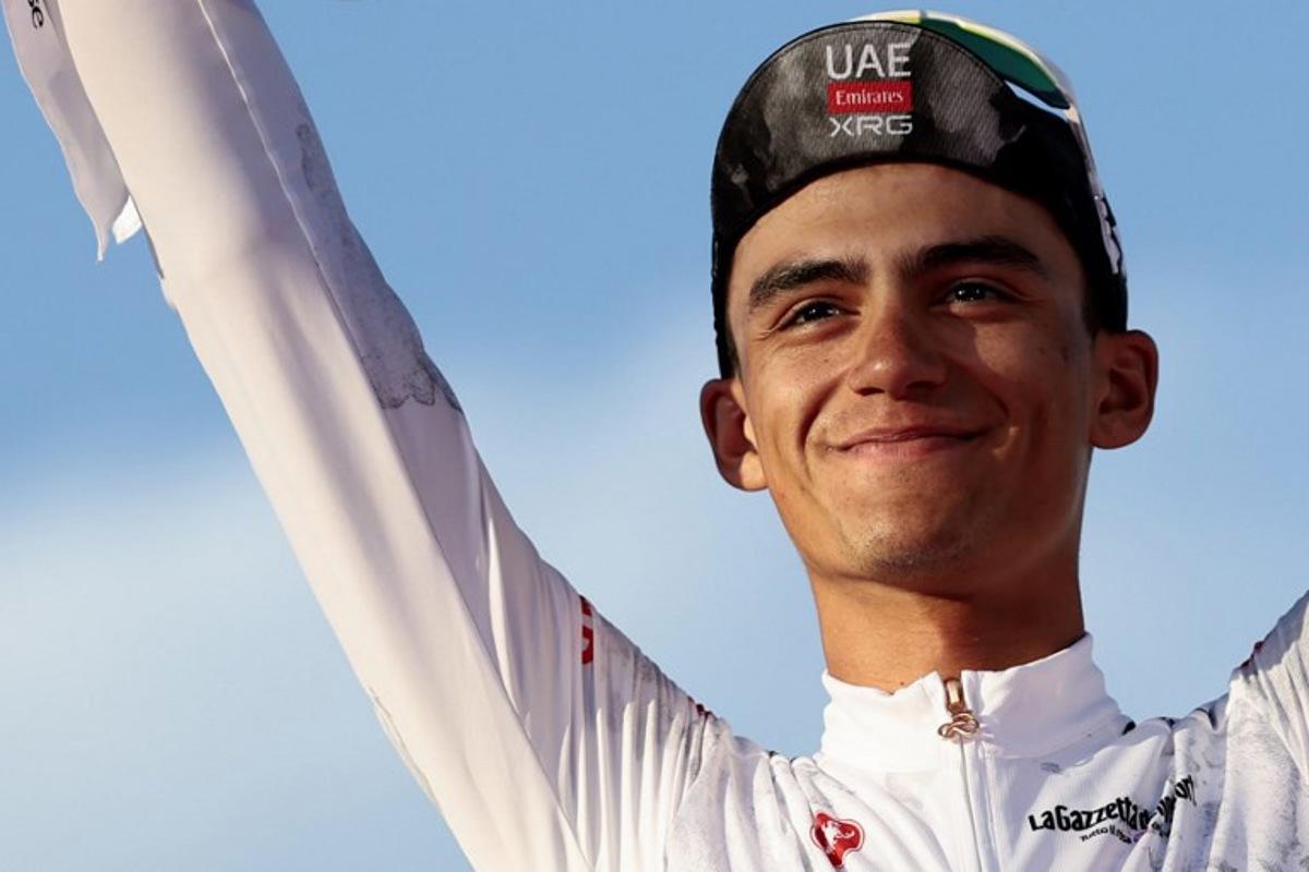 UAE Team Emirates XRG's Mexican rider Isaac Del Toro wearing the best young rider's white jersey (Maglia Bianca) celebrates on the podium at the end of the 21st and last stage of the 108th Giro d'Italia cycling race of 143kms from Rome to Rome on June 1, 2025.  Luca Bettini / AFP