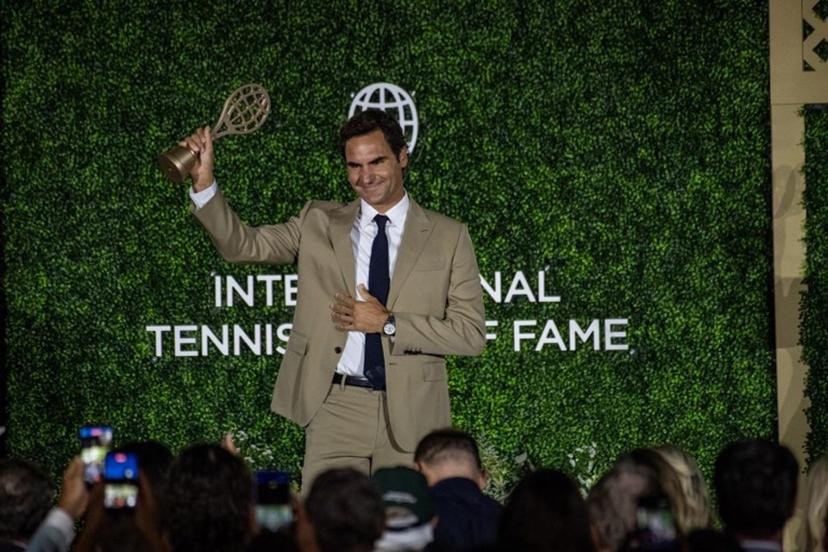 Swiss former tennis player Roger Federer accepts his induction into the International Tennis Hall of Fame during a ceremony in Newport, Rhode Island, on August 29, 2026.  Joseph Prezioso / AFP