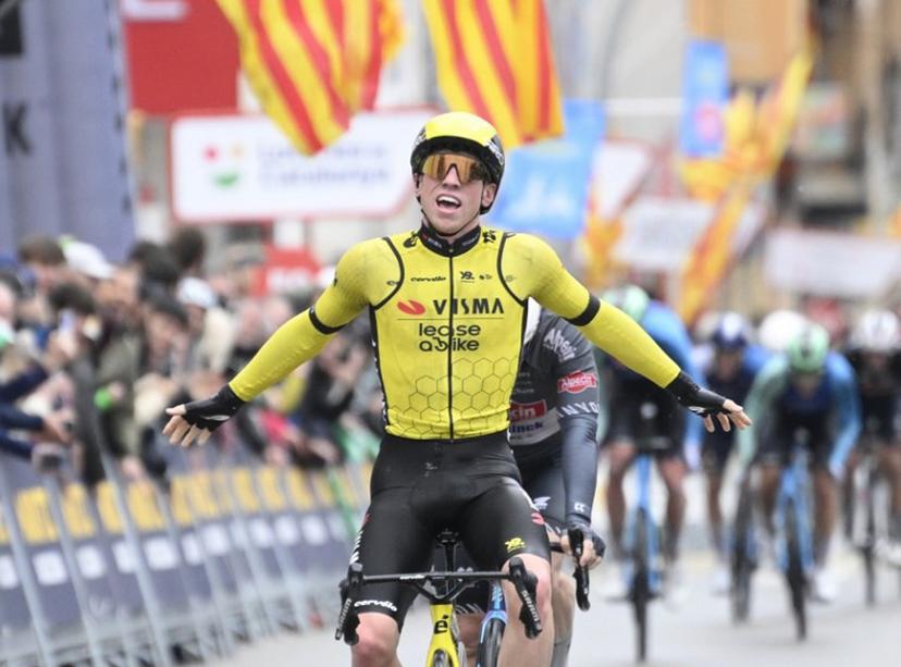 Team Visma's British rider James Matthew Brennan (L) celebrates crossing first the finish line ahead of Team Alpecin's Kaden Groves at the end of the first stage of the 2025 Volta a Catalonya cycling tour of Catalonya, a 178,3 km loop starting and finishing in Sant Feliu de Guixols, on March 24, 2025.  Josep LAGO / AFP
