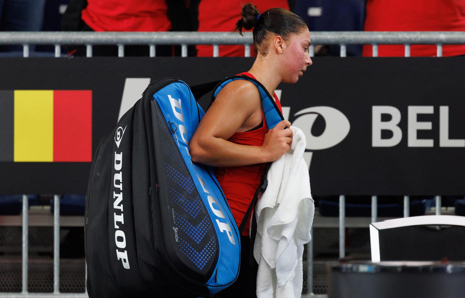 Belgian Sofia Costoulas looks dejected after the first game between Belgian Costoulas and Turkish Aksu in the Billie Jean King Cup Play-offs, between Belgium and Turkey, on Saturday 15 November 2025 in Ismaning, Germany. PHOTO BENOIT DOPPAGNE
