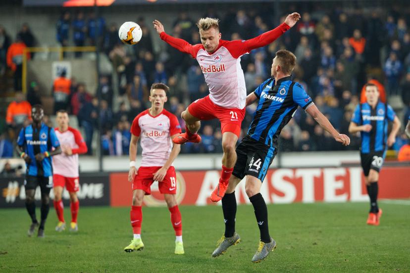 Salzburg's Fredrik Gulbrandsen and Club's Brandon Mechele fight for the ball during a soccer game between Belgian team Club Brugge KV and Austrian club FC Red Bull Salzburg, the first leg of the 1/16 finals (round of 32) in the Europa League competition, Thursday 14 February 2019 in Brugge. BELGA PHOTO KURT DESPLENTER