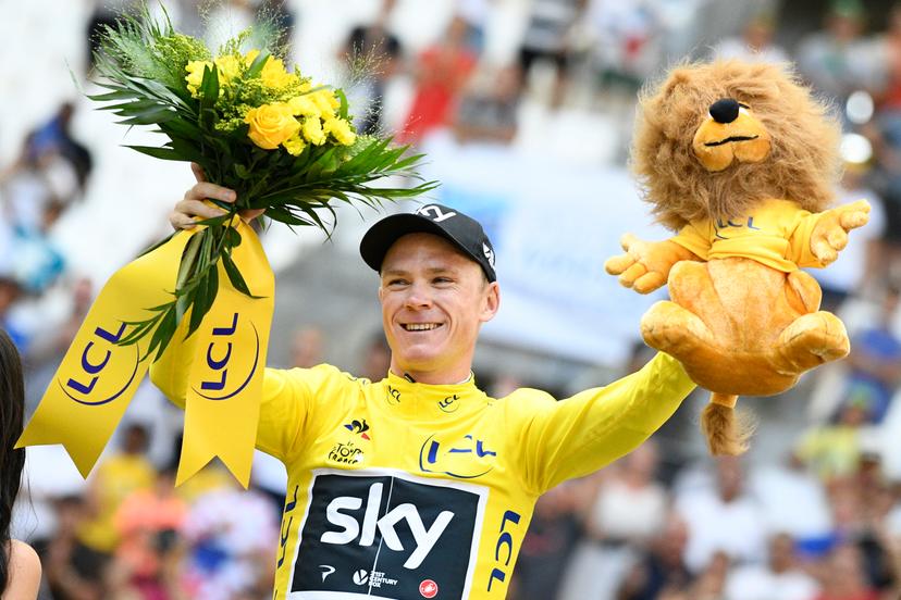 British Chris Froome of Team Sky celebrates on the podium in the yellow jersey of leader in the overall ranking after the twentieth stage of the 104th edition of the Tour de France cycling race, an individual time trial in Marseille, France, Saturday 22 July 2017. This year's Tour de France takes place from July first to July 23rd. BELGA PHOTO YORICK JANSENS