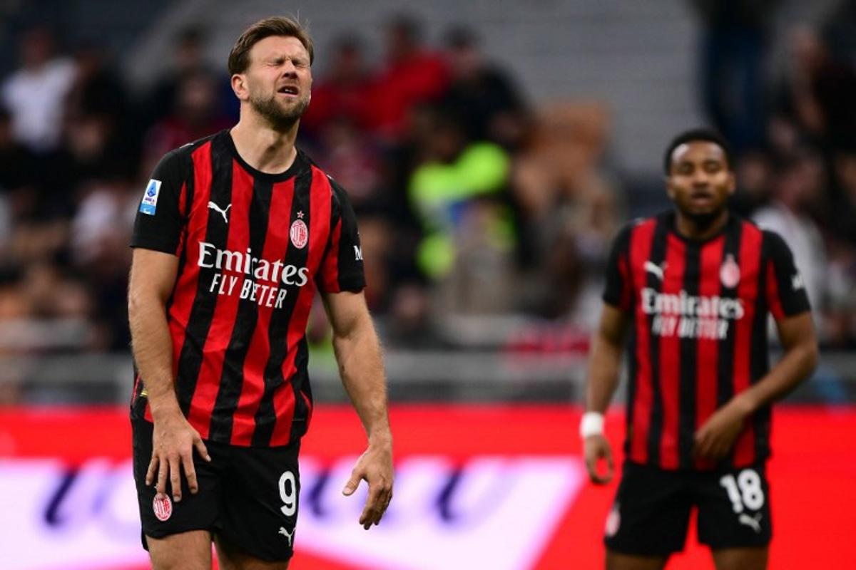 AC Milan's German forward #09 Niclas Fullkrug reacts during the Italian Serie A football match between AC Milan and Udinese at the San Siro Stadium in Milan, northern Italy, on April 11, 2026.  MARCO BERTORELLO / AFP
