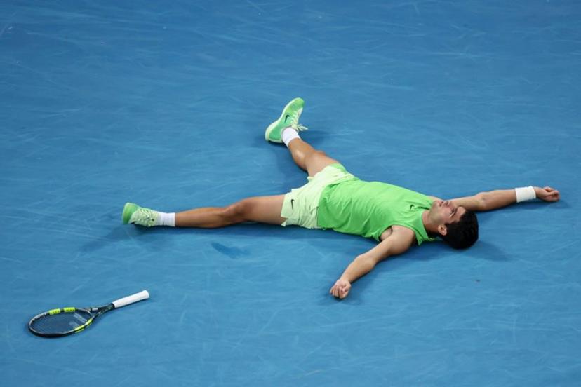 Spain's Carlos Alcaraz celebrates victory over Germany's Alexander Zverev after their men's singles semi-final match on day thirteen of the Australian Open tennis tournament in Melbourne on January 30, 2026.  David GRAY / AFP