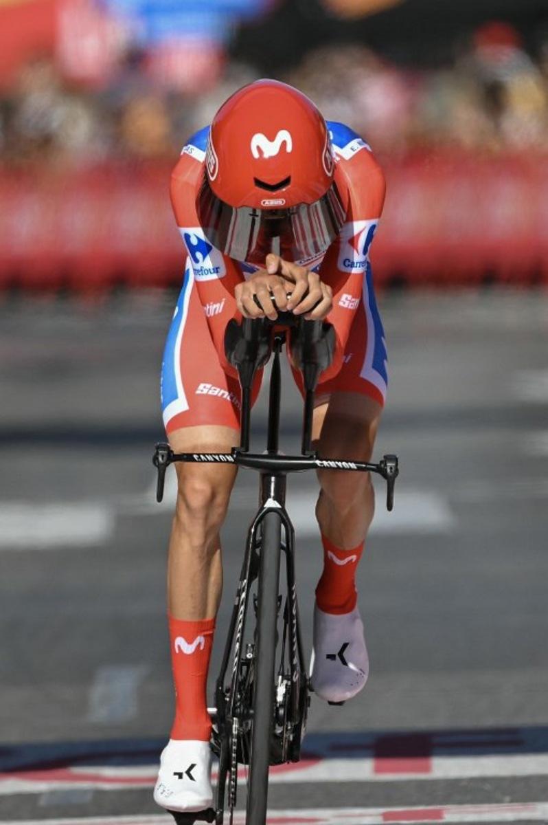 Overall race leader Team Movistar's Spanish rider Enric Mas crosses the finish line of the 18th stage of the Vuelta a Espana 2026 cycling tour, a 32,1 km individual time-trial race between El Puerto de Santa Maria and Jerez de la Frontera, on September 10, 2026.   JORGE GUERRERO / AFP