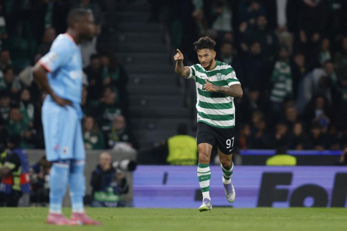 Sporting Lisbon's Colombian forward #97 Luis Suarez celebrates scoring his team's second goal during the UEFA Champions League, league phase day 5 football match between Sporting CP and Club Brugge at Jose Alvalade stadium in Lisbon on November 26, 2025.  FILIPE AMORIM / AFP