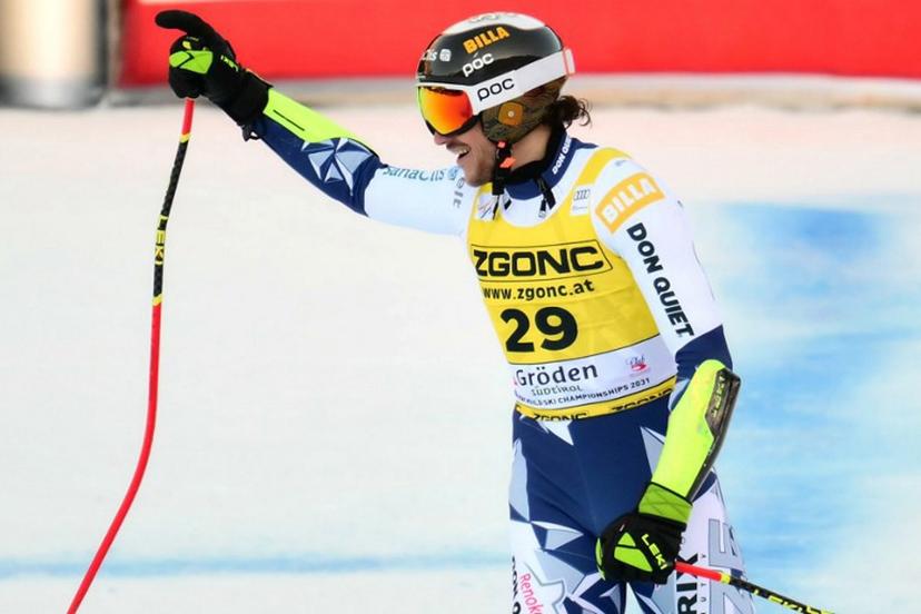 Czech Republic's Jan Zabystran celebrates after crossing the finish line of the men's Super G race during the FIS Alpine Ski World Cup, in Val Gardena, on December 19, 2025.   Stefano RELLANDINI / AFP