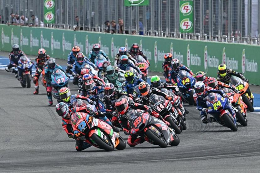 Riders take the start of the Moto2 race at the MotoGP Thailand Grand Prix at the Buriram International Circuit in Buriram on March 2, 2025.  MOHD RASFAN / AFP