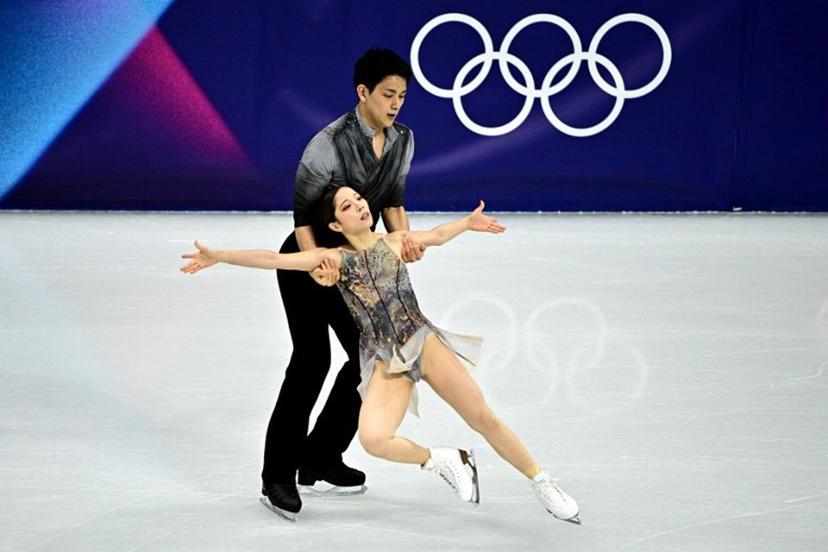 Japan's Riku Miura and Ryuichi Kihara compete in the figure skating pair skating free skating final during the Milano Cortina 2026 Winter Olympic Games at Milano Ice Skating Arena in Milan on February 16, 2026.  JULIEN DE ROSA / AFP