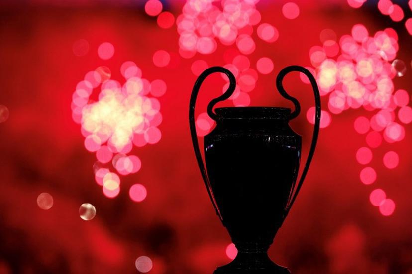 The silhouette of the UEFA Super Cup trophy is seen as the club celebrate the 2024-2025 season's trophies (Ligue 1, Coupe de France, Trophée des Champions, the UEFA Champions League) after the French L1 football match between Paris Saint-Germain (PSG) and Angers SCO at the Parc des Princes Stadium in Paris on August 22, 2025.  FRANCK FIFE / AFP