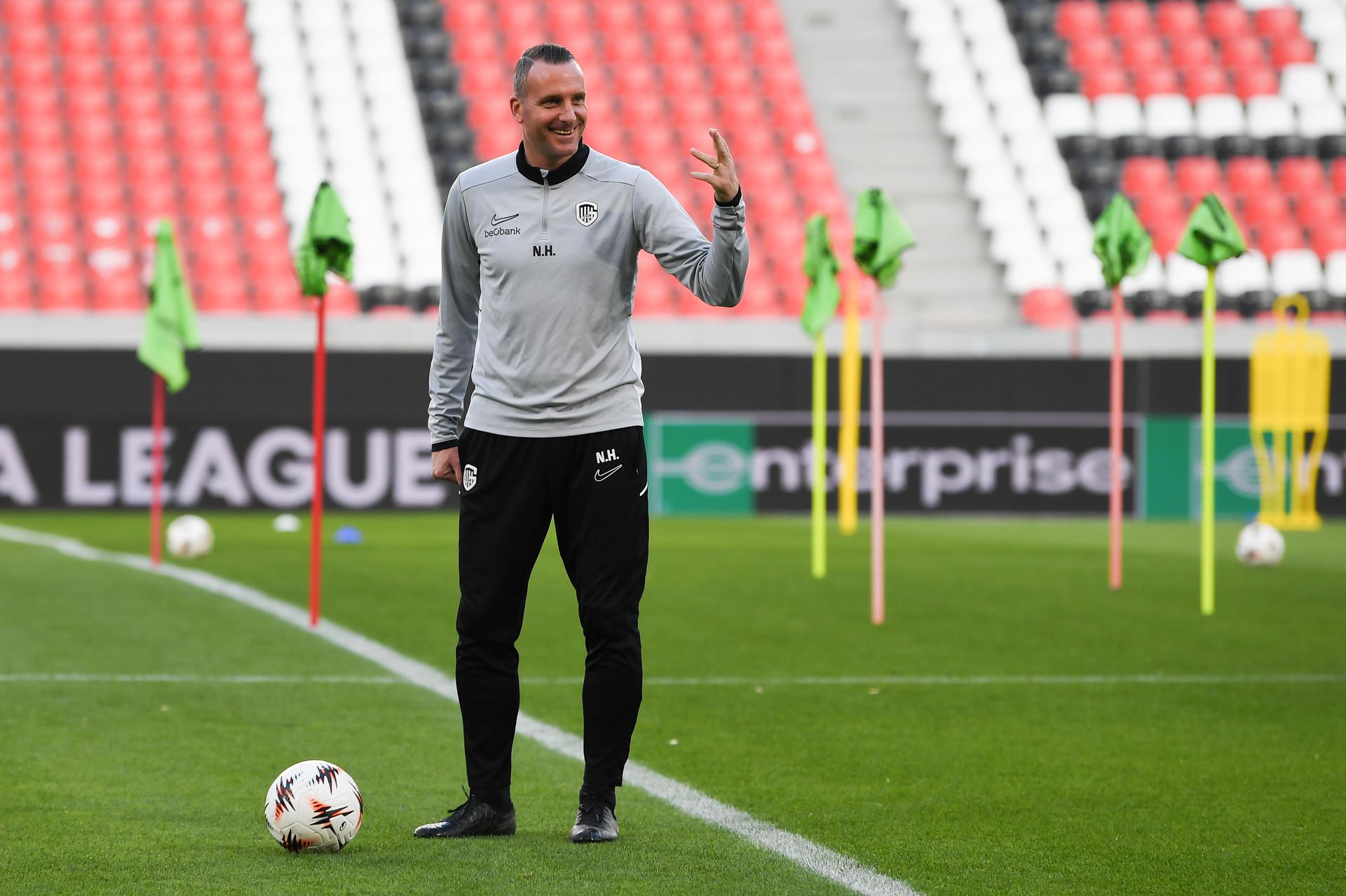 Genk's head coach Nicky Hayen pictured in action during a training session of Belgian soccer team KRC Genk in Freiburg im Breisgau, Germany on Wednesday 18 March 2026. The team is preparing for tomorrow's match against German Sport-Club Freiburg, the return leg of the 1/16 Finals of the UEFA Europa League tournament. Genk won the first leg 1-0. BELGA PHOTO JILL DELSAUX