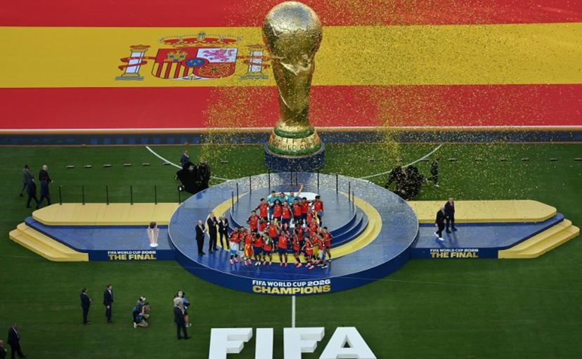 Spain's players celebrate with the trophy during the final ceremony after the 2026 World Cup football tournament final match between Spain and Argentina at the New York/New Jersey Stadium in East Rutherford on July 19, 2026.   ANGELA WEISS / AFP
