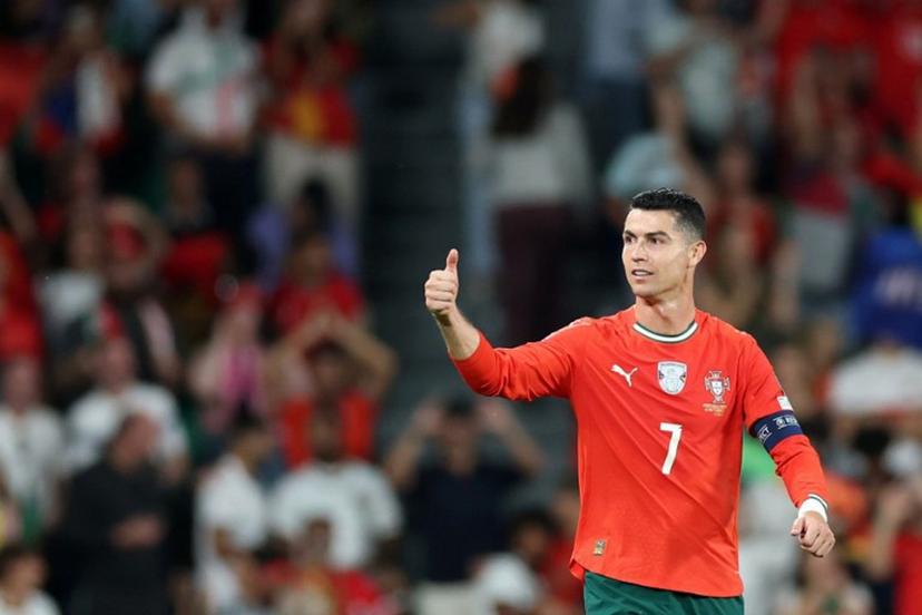 Portugal's forward #07 Cristiano Ronaldo celebrates scoring his team's second goal during the 2026 World Cup qualifiers Europe zone group F football match between Portugal and Hungary at Jose Alvalade stadium in Lisbon on October 14, 2025.  PATRICIA DE MELO MOREIRA / AFP