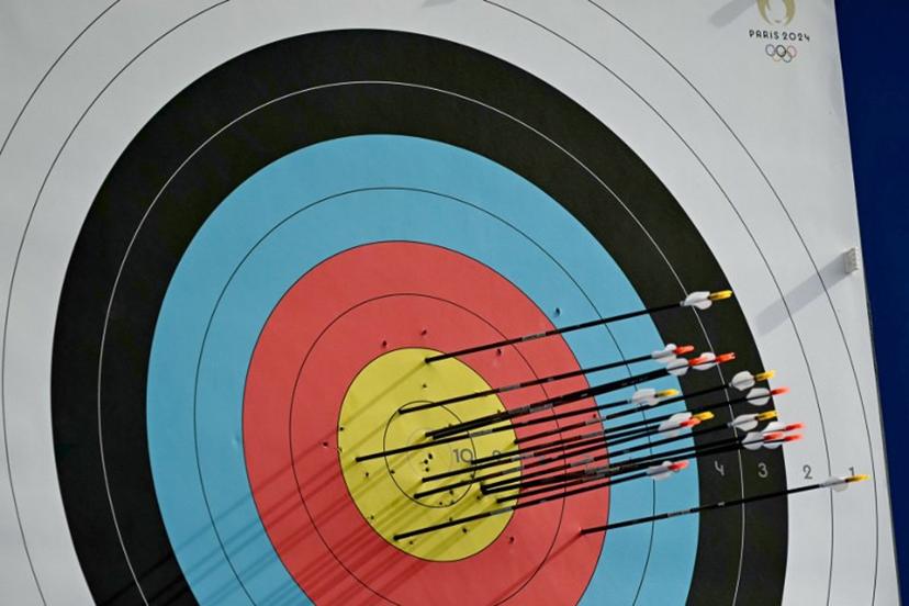 A detailed view of the target and arrows is seen during the archery women's individual preliminary round during the Paris 2024 Olympic Games at the Esplanade des Invalides in Paris on July 25, 2024.  Punit PARANJPE / AFP