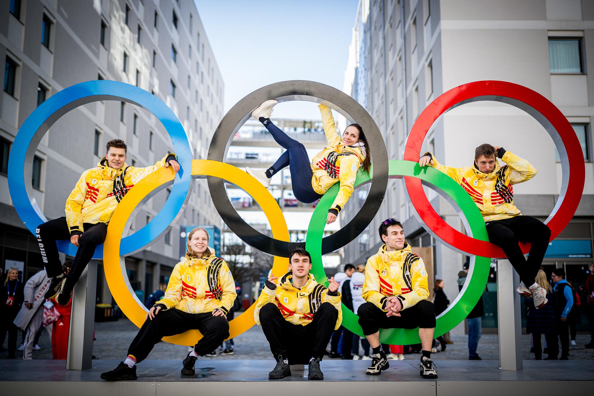 Belgian shorttrack skater Warre Van Damme, Belgian shorttrack skater Tineke den Dulk, Belgian shorttrack skater Stijn Desmet, Belgian shorttrack skater Hanne Desmet, Belgian shorttrack skater Adriaan Dewagtere and Belgian shorttrack skater Ward Petre pose for the photographer during a visit to the Olympic Village, organised by the Belgian Olympic and Interfederal Committee (COIB), before the Milano Cortina 2026 Olympic Winter Games, on Thursday 05 February 2026 in Milan, Italy. The XXV Winter Olympics take place from 6 to 22 February 2026 in Italy. BELGA PHOTO JASPER JACOBS