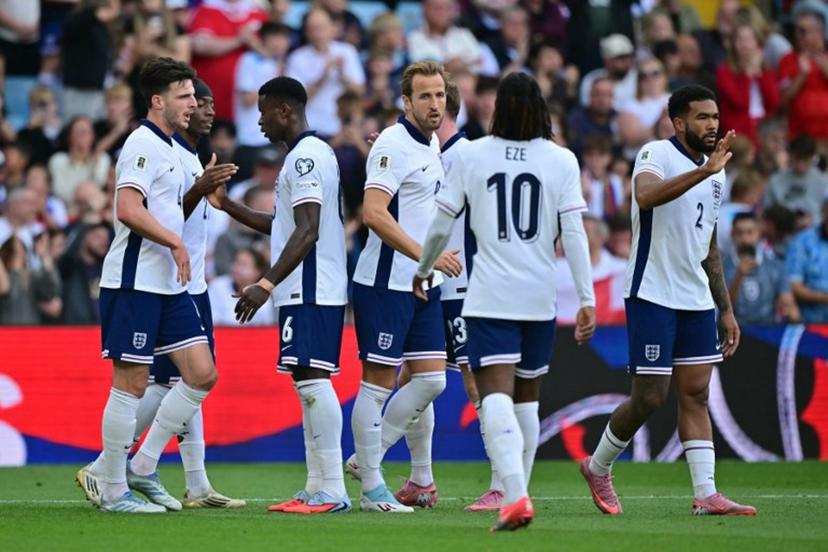 England's midfielder Declan Rice (L) celebrates after Andorra's midfielder #06 Christian Garcia scores an own goal during the 2026 World Cup Group K qualifier football match between England and Andorra, at Villa Park, in Birmingham, on September 6, 2025.   Ben STANSALL / AFP